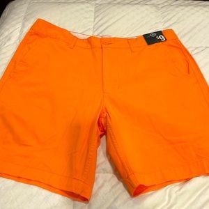 St John’s Bay men shorts size 36. Bright orange with pockets NWT